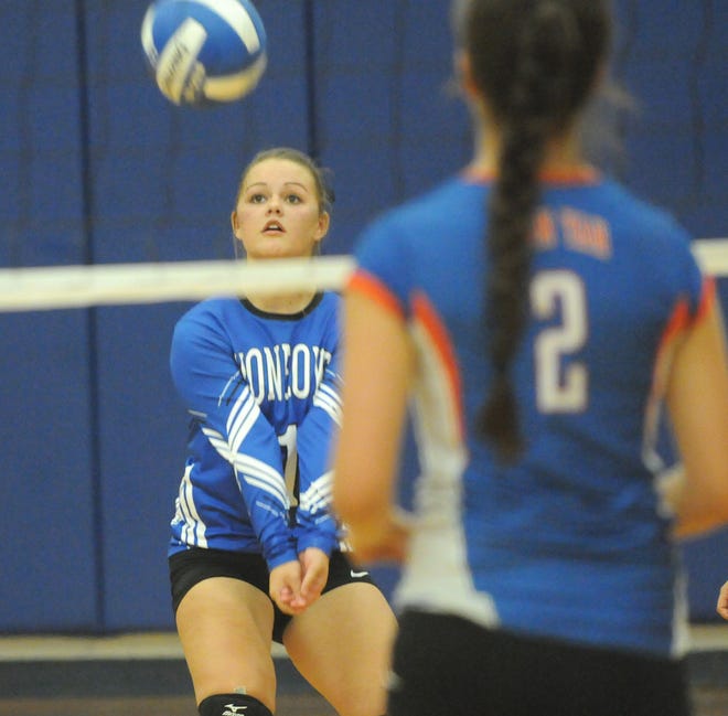 Jasmyn Bliven returns a shot from the back row in game one for Honeoye. Jack Haley/Messenger Post Media