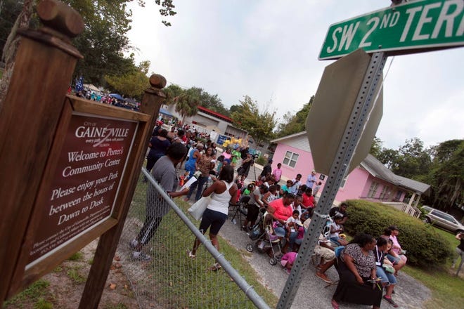 Locals gather in the Porter's Neighborhood for a block party in 2015. (File)