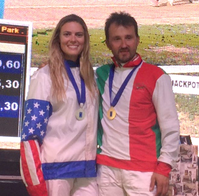 When points were tallied, harness driver Hanna Miller, left, had 60 points, giving her a heartbreaking second place in the World Cup of Amateau Harness Racing in Budapest, Hungary. Mirko Marini of Italy, right, became the champion with a score of 61. Photo by Joe Faraldo