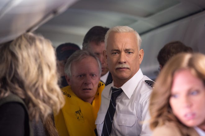 Captain Chesley Sullenberger (Tom Hanks) helps evacuate his plane moments after it lands in the Hudson River. (FilmNation Entertainment)