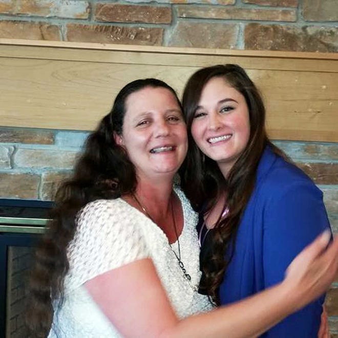 In this July 28, 2016 photo provided by Lanni Klasner, Rita Maze, left, and her daughter, Rochelle Maze, pose for a photo in Great Falls, Mont. Rita Maze was abducted in Montana on Sept. 6, 2016, and found dead in the trunk of her car, found abandoned near Spokane, Wash., International Airport early on Sept. 7. (Lanni Klasner via AP)