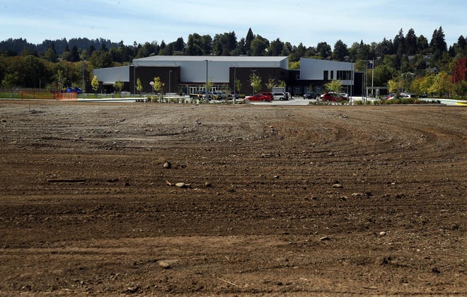 The site of the old Roosevelt Middle School is now an empty lot after the building was demolished after the construction of the new Roosevelt Middle School which opened for classes classes in Eugene on September 8, 2016. (Andy Nelson/The Register-Guard)