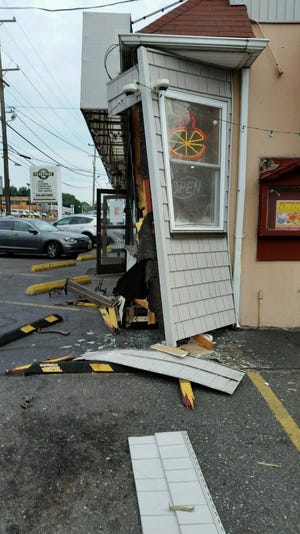 A car hit the front of Don Giovanni's Classic Bakery on Street Road in Lower Southampton on Saturday, Sept. 10, 2016. No one was injured, police said.