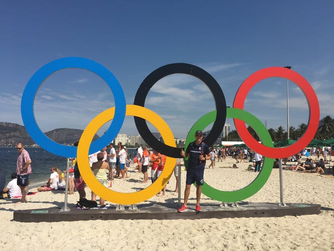 Juan Pablo del Solar poses in front of the Olympic rings in Rio. The Holland resident coached Chile's sailing team. Contributed