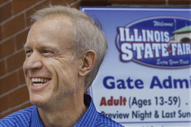 File - In this Aug. 12, 2016 file photo, Illinois Gov. Bruce Rauner participates in opening ceremonies at the Illinois State Fair in Springfield, Ill. With Illinois facing about $180 million in maintenance and repairs to its state fairgrounds, the organization newly formed to raise money for that work has its hands full. (AP Photo/Seth Perlman, File)