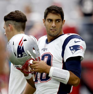 With Tom Brady suspended for the first four games of the season, Jimmy Garoppolo (pictured) made his first NFL start on Sunday night when the Patriots played the Cardinals in a game that ended too late for this edition.