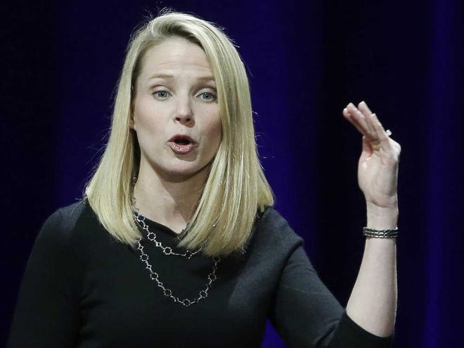 FILE - In this Feb. 19, 2015, file photo, Yahoo President and CEO Marissa Mayer delivers the keynote address at the first-ever Yahoo Mobile Developer's Conference, in San Francisco. Mayer stands to collect a $44 million severance package if she leaves after Verizon completes its purchase of the once-mighty internet company. Mayer hasn't announced plans to leave, but industry observers say she's unlikely to stay after the $4.8 billion sale closes early next year.(AP Photo/Eric Risberg, File)