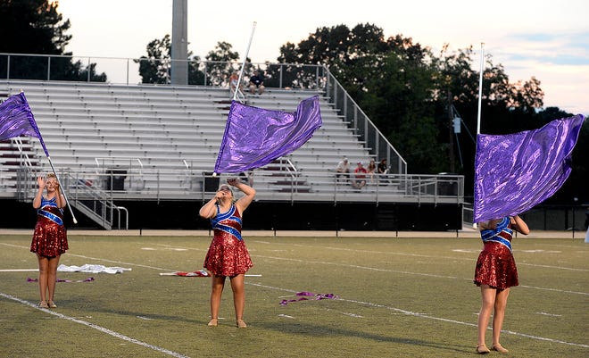 West End High School color guard members perform during a past Etowah County Band and Cheer Expo at Titan Stadium. This year's event is at 6:30 p.m. Sept. 13.