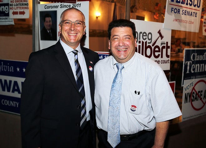 The Herkimer County Republican Committee celebrated several victories Tuesday after primary results. Herkimer County District Attorney Jeffrey Carpenter, left, and Herkimer County District 3 Coroner Vincent Enea smile for a photo after the results. Both won their respective races. PHOTO COURTESY/MIKE RAY
