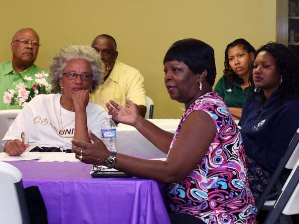 Retired teacher Margaret Ricker discusses problems she encountered attempting to make upgrades to her former Lincolnville home during the 300 Concerned Citizens organizational meeting, held at St. Paul AME Church in Lincolnville on Tuesday.