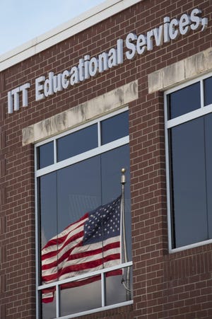 ITT Educational Services headquarters in Carmel, Ind., is shown Tuesday, Sept. 6, 2016. The company, which operates vocational schools, announced "with profound regret" in a statement Tuesday that it is ending academic operations at all of its more than 130 campuses across 38 states. (AP Photo/Michael Conroy)