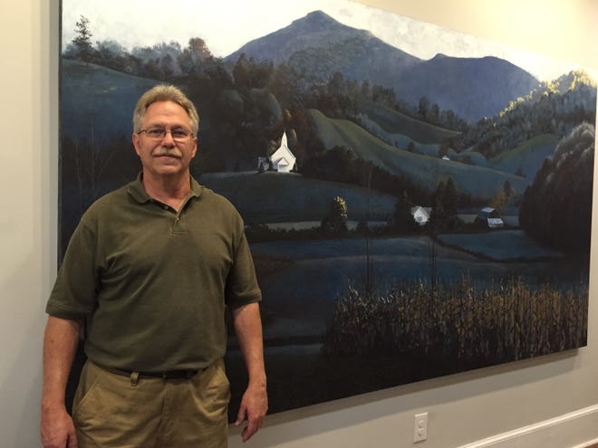Gary Freeman in front of one of his works at the Heritage Parks Art Center. Freeman recently opened the new art center in Cherryville and is offering several classes throughout the fall. Casey White/The Star.