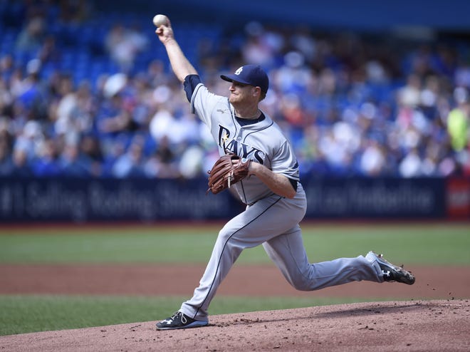 Tampa Bay Rays pitcher Alex Cobb throws against the Toronto Blue Jays during the first inning of a baseball game in Toronto on Wednesday, Sept. 14, 2016. THE ASSOCIATED PRESS / FRANK GUNN