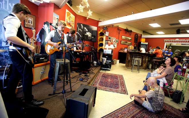 Drew Spencer performs with a group of young musicians including Marley Spencer and Kayla Goller at Dragonfly Wine Market on Saturday for the Art of Sound music festival. (Star file photo)