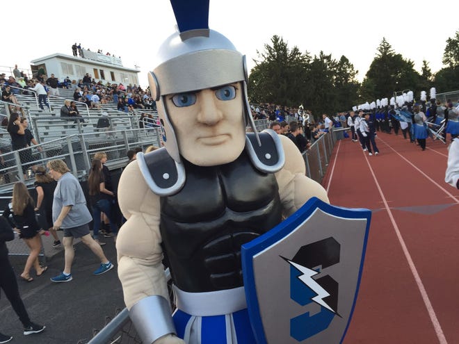 CB South titan arrives on the field before the start of football game with CB East Friday night.