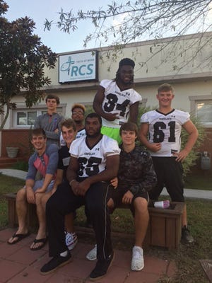 Havelock High School football players donate an hour of their time Thursday evenings to provide community service through Reviving Lives Ministries.