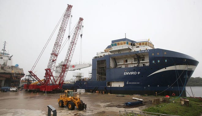 Ships are under construction at Eastern Shipbuilding's Nelson Street facility in Panama City on Friday. The company just landed a $10.5 billion contract — the largest in U.S. Coast Guard history — to build the first series of nine offshore patrol cutters.