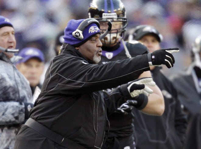 In this Dec. 19, 2010 photo, Baltimore Ravens defensive line coach Clarence Brooks directs his players during the second half of a game against the New Orleans Saints in Baltimore. Brooks, who served as a defensive line coach with the Ravens for 11 years, died Saturday in Weston, Fla. He was 65. AP FILE PHOTO