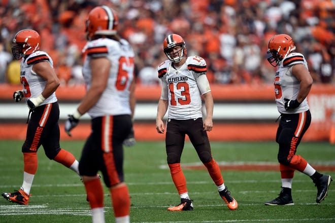 Browns quarterback Josh McCown (13) reacts after his pass was intercepted by the Ravens' C.J. Mosley in the game's final seconds.
