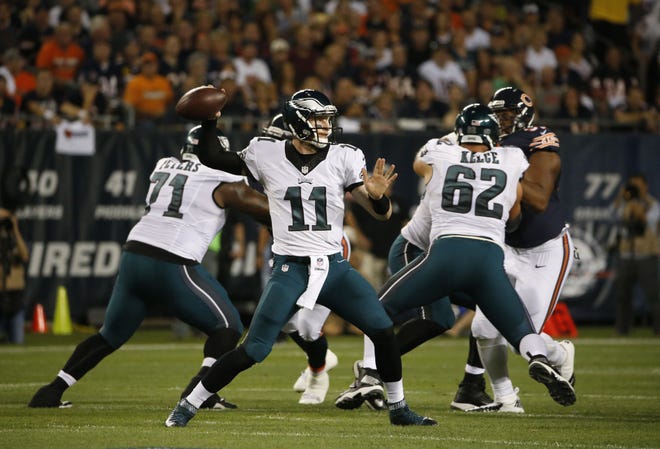 Eagles quarterback Carson Wentz (11) threw for 190 yards and a touchdown against the Chicago Bears on Monday, Sept. 19, 2016, in Chicago. The Eagles won 29-14.