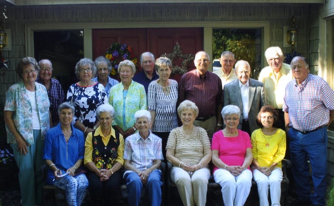 Pictured at the reunion are, seated from left: Pat Irvin Hardin, Iva Mae Jones Mellon, Fannie Bell Daves Brown, Betty White Mauney, Carole Lackey Champion and Pat Mintz Crawford. Standing, from left: Marietta Gettys Floyd, Jerry Floyd, Doris Hoyle Lattimore, Frances Floyd Champion, Mary White Gettys, Shannon White, JoAnn Webb, Floyd Hastings, Pearlie Bowman, Arnold Gibbs, Bobby Hubbard and Dayne Grigg. Submitted photo.