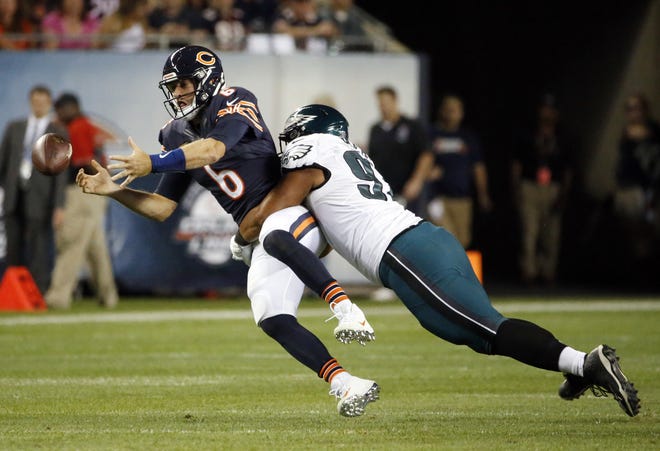 Chicago Bears quarterback Jay Cutler (6) fumbles as he is tackled by Philadelphia Eagles defensive tackle Destiny Vaeao (97) during the second half of an NFL football game, Monday, Sept. 19, 2016, in Chicago. (AP Photo/Nam Y. Huh)
