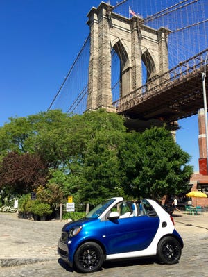 The 2017 smartfortwo cabriolet in Brooklyn. Available in passion, prime and proxy trim levels from $19,650, the smart is less than 9-feet long and just over 5-by-5 feet tall and wide, but astonishingly roomy inside. The 89HP three-cylinder gas engine comes with either a 5-speed manual or 6-speed dual-clutch automatic gearbox. Protection includes a Tridion Safety Cell and six airbags (eight in the hardtop coupe); forward collision warning is available. (Author)