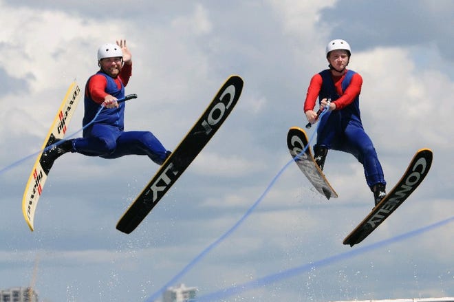 Brian Robbins and Donovan Vega get high in the air off of a ramp jump.

The Sarasota Ski-A-Rees Water Ski Show Team entertain the audience during their first show of the fall season on Sunday afternoon.

September 11, 2016; 

Herald Tribune photo / Carla Varisco