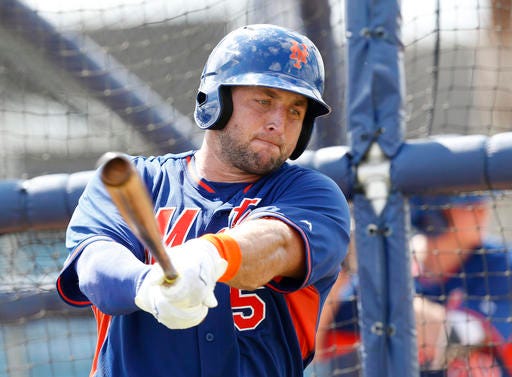 Tim Tebow practices his swing during batting practice, Tuesday, Sept. 20, 2016, in Port St. Lucie, Fla. The 2007 Heisman Trophy winner and former NFL quarterback practiced at the New York Mets' complex during his second workout as part of their instructional league team. (AP Photo/Wilfredo Lee)
