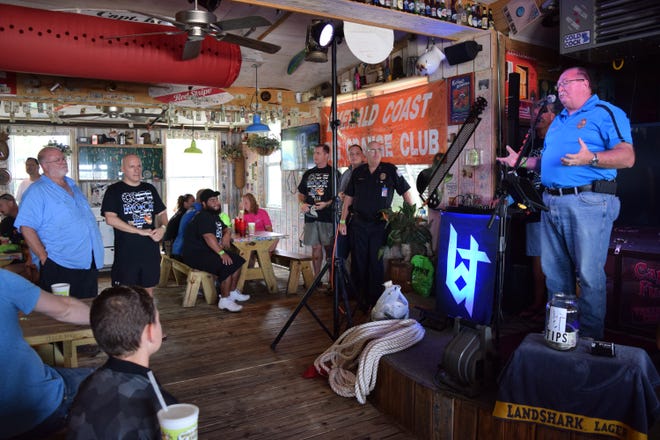 ANNIE BLANKS | The Destin Log
Crestview Police Chief Tony Taylor speaks to the officers and families who came out to Fudpuclers’ ‘Cops Rock’ event, where law enforcement officers and their families received a day full of free food, fun and entertainment.