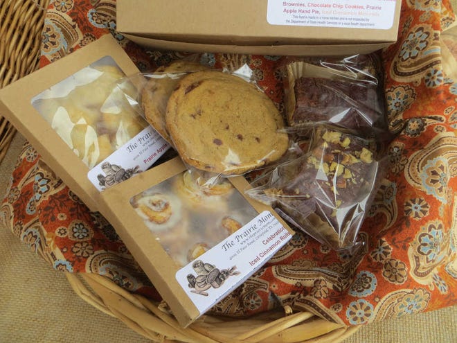The Prairie Mom's tailgate treat box inlcudes cinnamon roles, brownies, chocolate chip cookies and a Prairie Apple pie.