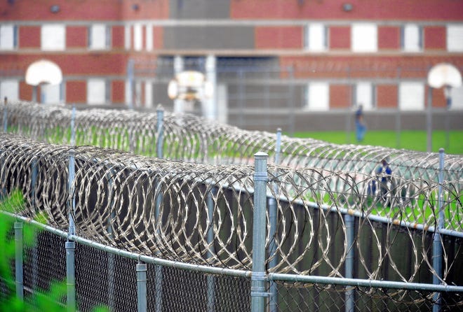 Behind the rows of barbed wire sits the Monroe County Correctional Facilitynear Snydersville.