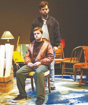 Lake Superior State University senior Benjamin Bryer, seated, and fellow LSSU student Ben Eisenman rehearse their upcoming play “Lonely Planet.” The play will be presented at the LSSU Arts Center on Thursday and Friday at 7 p.m. and on Saturday at 2 p.m.