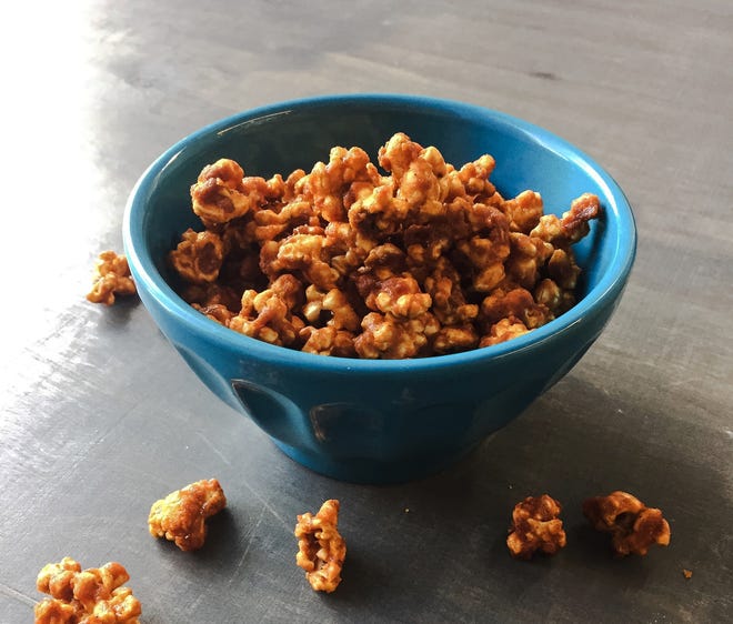 Dorie Greenspan's Caramel-Honey Popcorn can be spiced up with chipotle and cinnamon. 



Washington Post/Dudley M. Brooks