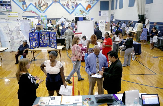 Job seekers and employers at the King Center during the Job Fair hosted last Tuesday by the city of Gainesville Office of Equal Opportunity. The event featured about 60 vendors, on-site interviews and food trucks. Matt Stamey/Special to the Guardian