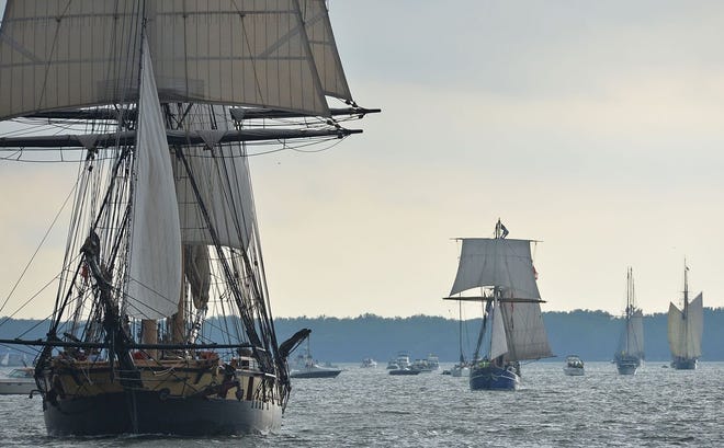 The U.S. Brig Niagara, at left, leads the Parade of Sail through Presque Isle bay Sept. 8, opening the Tall Ships Erie festival. CHRISTOPHER MILLETTE/ERIE TIMES-NEWS