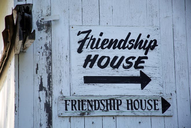 This Friendship House sign points the way to food, clothing and furniture for families in need. MELODY BURRI/MESSENGER POST MEDIA