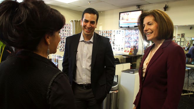 Democratic congressional candidates Ruben Kihuen and Catherine Cortez Masto meet with supporters at a hair salon in Las Vegas on Sept. 16. Washington Post photo by Dalton Bennett