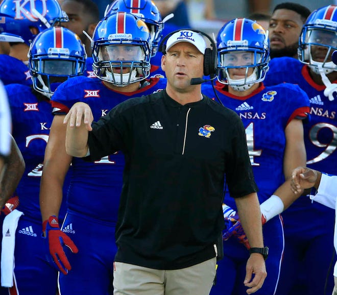 Kansas head coach David Beaty directs his team during the first half of the Jayhawks' 55-6 blowout of Rhode Island on Saturday.