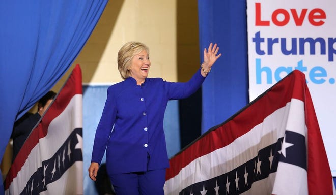 Democratic presidential nominee Hillary Clinton responds to cheering supporters as she takes the stage for her rally Wednesday, Sept. 21, 2016 in Orlando, Fla. (Joe Burbank/Orlando Sentinel/TNS)