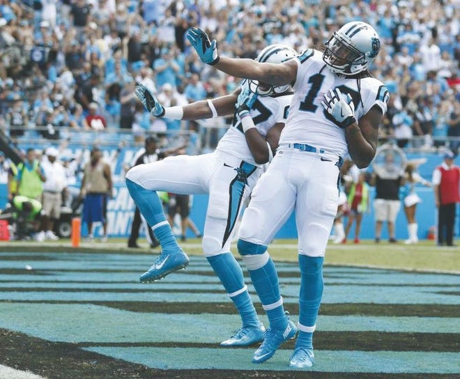 NICE MOVES — Devin Funchess, left, and Kelvin Benjamin were fined for this celebration.