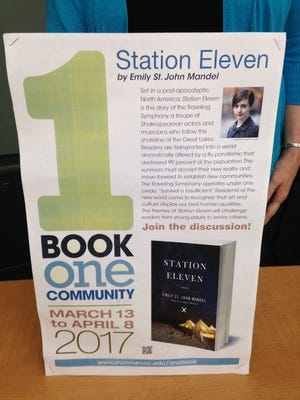 The promotional sign for "Station Eleven" as the 2017 Monroe County One Book, One Community selection. (Monroe News photo by PAULA WETHINGTON)