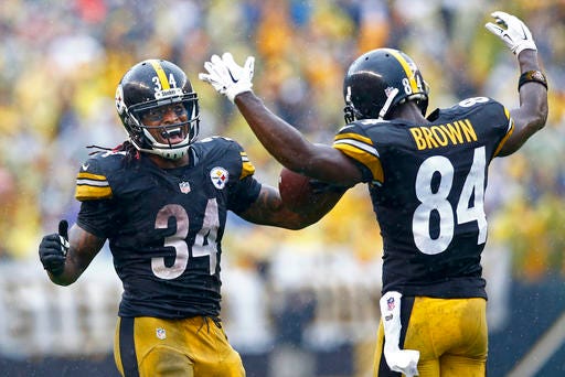 FILE - In this Sunday, Sept. 18, 2016, file photo, Pittsburgh Steelers running back DeAngelo Williams (34) celebrates his touchdown with wide receiver Antonio Brown (84) during the second half of an NFL football game against the Cincinnati Bengals in Pittsburgh. Williams leads the NFL in rushing in his 11th pro season, Brown is the game's most dangerous wideout, and Ben Roethlisberger is making big plays. (AP Photo/Jared Wickerham, File)