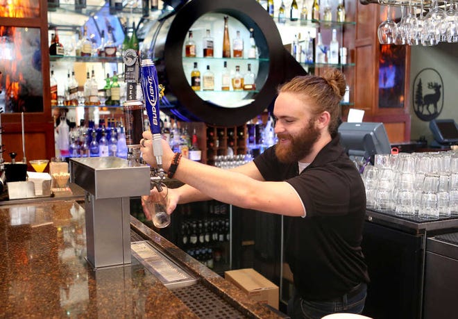 The Blue Moose Bar & Grill is gaining a reputation for its happy hour, which features discounted prices on wine, beer and specialty drinks, and half-price appetizers. The Topeka location has become the most successful of the Overland Park-based KC Hopps Ltd.'s same-named operations.