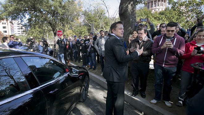 Elon Musk, CEO of SpaceX and Tesla Motors, spoke at the keynote luncheon for the 10th Annual Texas Transportation Forum at the Austin Hilton in downtown Austin Thursday afternoon January 15, 2015 and afterwards rode over to the Texas State Capitol to meet with supporters and Tesla electric car owners before lobbying legislators.