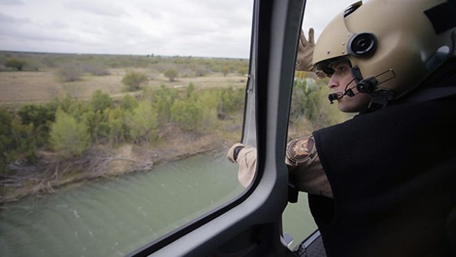 U.S. Customs and Border Protection Air and Marine agents patrol along the Rio Grande on the Texas-Mexico border, Tuesday, Feb. 24, 2015, near Rio Grande City, Texas. (AP Photo/Eric Gay)