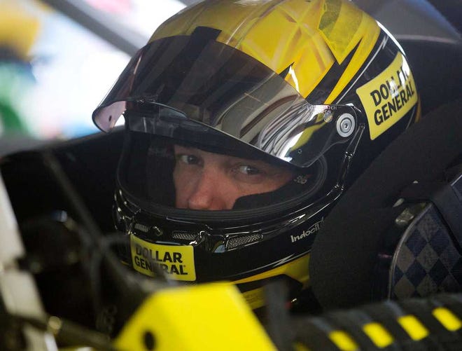 Matt Kenseth gets ready for practice for Sunday's NASCAR Sprint Cup Series auto race at New Hampshire Motor Speedway Friday, Sept. 23, 2016, in Loudon, N.H. (AP Photo/Jim Cole)
