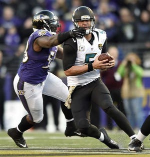 Gail Burton Associated Press Ravens linebacker Elvis Dumervil grabs Jaguars quarterback Blake Bortles' face mask on the last play of regulation. The next day, the NFL said this play should have been blown dead because of a false start.