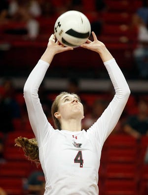 Texas Tech's Toni McDougald (16) returns a serve during the 3-0 losing match against West Virginia, Saturday, Sept. 24, 2016, at United Supermarkets Arena in Lubbock, Texas. (Brad Tollefson/A-J Media)