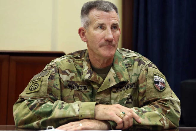FILE - In this July 27, 2016 file photo, U.S. Army Gen. John Nicholson is interviewed by The Associated Press at his office in Kabul, Afghanistan. The Taliban have control over 10 percent of Afghanistan's population and the insurgent group is battling with the Afghan government for control of at least another 20 percent, the top U.S. commander in Afghanistan said Friday, Sept. 23, 2016, describing a tough fight that is costing a high level of Afghan casualties. Nicholson said many of the Afghan deaths are in battles over checkpoints, where there are often a small number of forces who are poorly led, ill-equipped and not well trained. (AP Photo/Massoud Hossaini, File)
